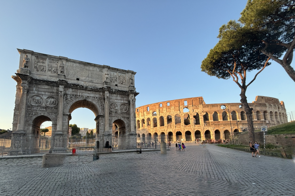 A photo of the Constantine Arch and the Roman Colosseum