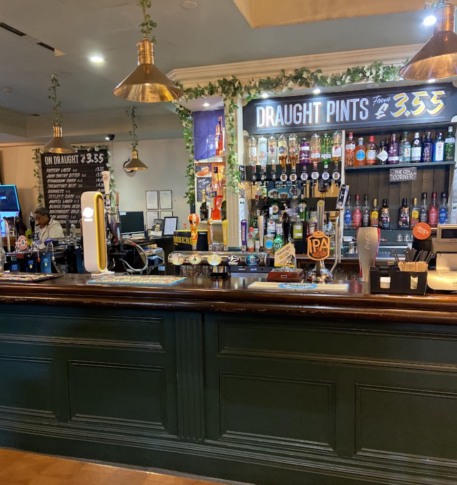 A photo of the inside of an English Pub.